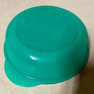 Tupperware vent n serve, never used 4 1/4 cups.  Microwave safe, dishwasher safe